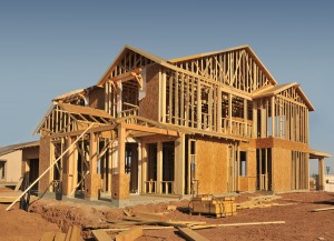 A new home being built with wood, trusses and supports